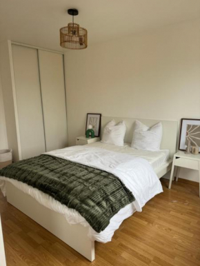 Appartement cosy proche de Paris avec Parking privé